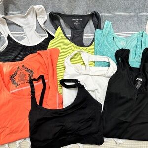 6 pc Med Workout tops Reebox , Tek Gear, Avia, Danskin, Marika Tek sports bra